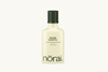 Bottle of norai Bare Earth Cleansing Oil on a white background