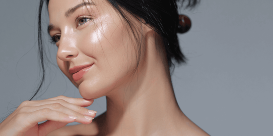 Close-up of a woman's face with a neutral background