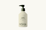 Lotion bottle labeled 'Bare Earth' by 'norai' on a white background