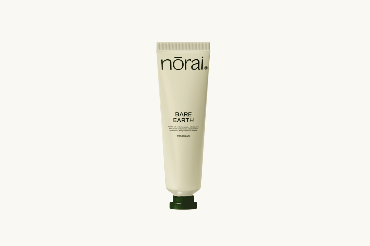 Tube of norai Bare Earth product on a white background
